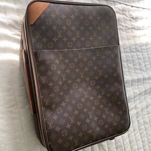 Louis Vuitton carry on rolling suitcase NWOT
